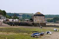 Boats beached low tide at Rock in the Camel Estuary in North Cornwall