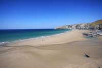 Trebarwith Strand - a sandy surf beach on the North Cornish coast photographed at low tide