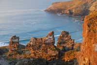 Sunlight on the rock pinnacles at West Quarry at Trebarwith Strand