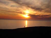 Sunset over Widemouth by Angela Channing